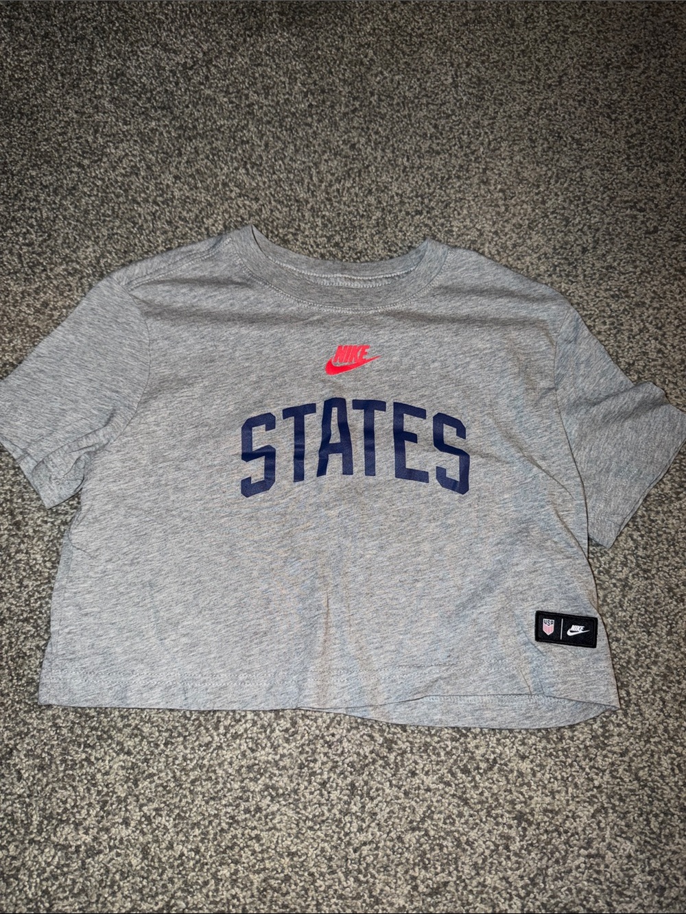 Nike Gray Cropped 'STATES' Tee with Pink Swoosh